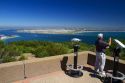 Tourists at a scenic overlook of San Diego and Coronado Island from Point Loma, California, USA.