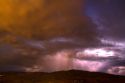 Lightning strikes during a thunderstorm on the first day of summer in Boise, Idaho, USA.
