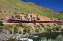 The Thunder Mountain Line scenic tourist train traveling along the Payette River between Horseshoe Bend and Banks, Idaho, USA.
