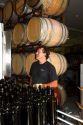 Winemaker tasting red wine at Woodriver Cellars in Eagle, Idaho, USA.