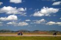 Motorcycle traveling on I-90 in northeast Wyoming near the South Dakota border, USA.