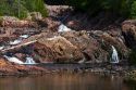 Aguasabon River flowing into Lake Superior at Terrace Bay, Ontario, Canada.
