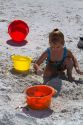 Four year girl playing at Madeira Beach in Pinellas County, Florida, USA.
