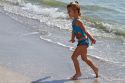 Four year girl playing at Madeira Beach in Pinellas County, Florida, USA.