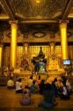 Buddhists praying at the Shwedagon Paya located in (Rangoon)Yangon, (Burma) Myanmar.
