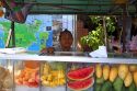 Street food vendors selling fruit at Chaweng beach village on the island of Ko Samui, Thailand.