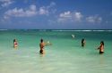 Women play volleyball in the Gulf of Thailand at Chaweng beach on the island of Ko Samui, Thailand.