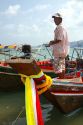 Fisherman on his boat in the Gulf of Thailand on the island of Ko Samui, Thailand.