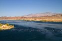 The Colorado River at Parker Dam creates Lake Havasu reservoir in La Paz County, Arizona and San Bernardino County, California, USA.