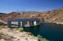 Parker Dam crossing the Colorado River creates Lake Havasu reservoir in La Paz County, Arizona and San Bernardino County, California, USA.
