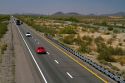 Vehicles travel on Interstate 10 west of Phoenix, Arizona, USA.