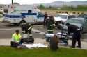 Paramedics and firefighters respond to an automobile injury accident in Boise, Idaho, USA.