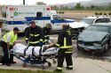 Paramedics and firefighters respond to an automobile injury accident in Boise, Idaho, USA.