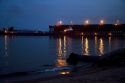 Great Lakes ore boat at dusk on Lake Superior at Marquette, Michigan, USA.