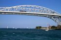 The Blue Water Bridge spanning the St. Clair River connects Port Huron, Michigan with Sarnia, Ontario, Canada.