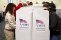 People vote in cardboard voting booths at a polling station in Boise, Idaho, USA.