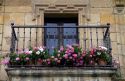 Veranda decorated in flowers at Santillana del Mar, Cantabria, Spain.