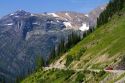 Red Jammer bus on the Going-to-the-Sun Road in Glacier National Park, Montana, USA.