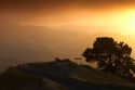 Mountain pass with fog at sunset near Hamilton in the Waikato Region, North Island, New Zealand.